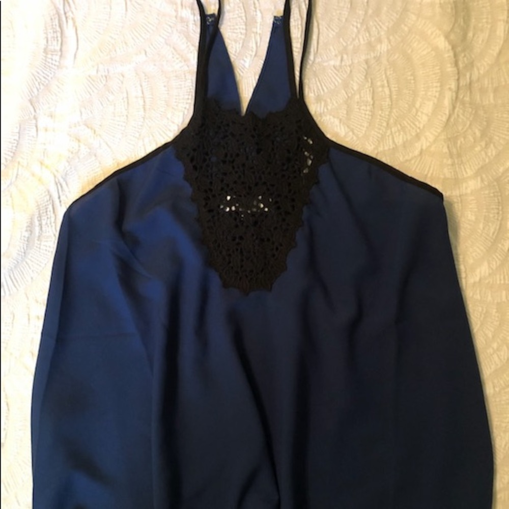 Blue tank with black lace detail.